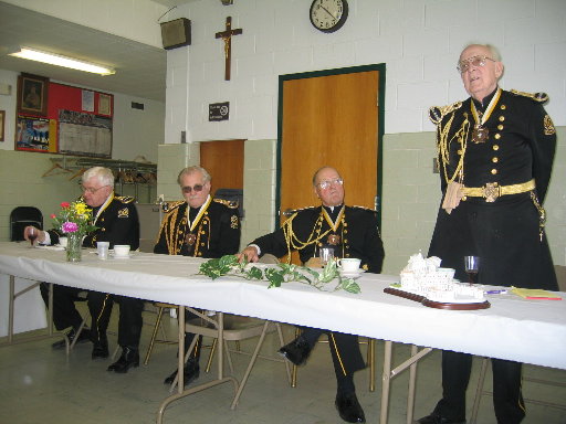 Capt. Len Kidd adresses the Battalion