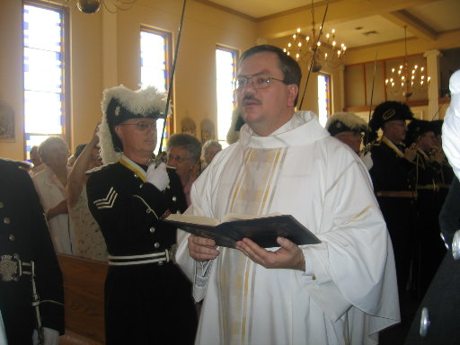 Fr. Darrell enters Queen of Heaven